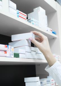 Closeup pharmacist hand